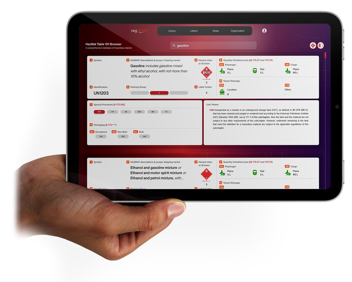 Hand holding tablet displaying RegLogic application on a construction site
